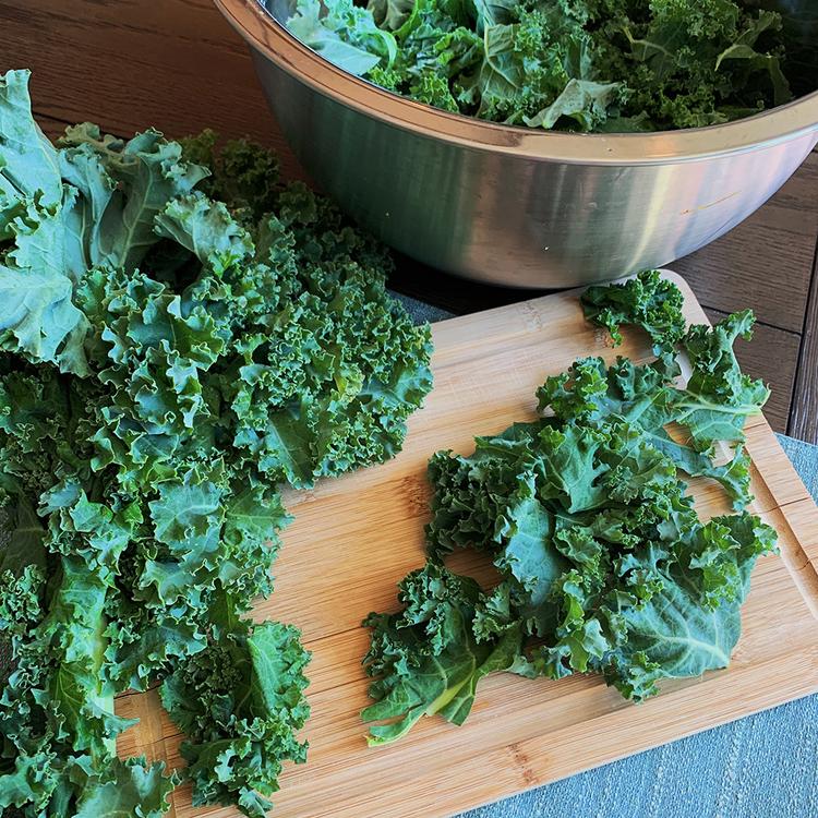Photo of kale leaves being separated