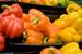 Photo of red, orange, and yellow peppers