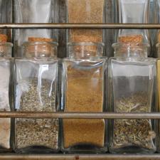 Photo of a spice rack with jars full of spices