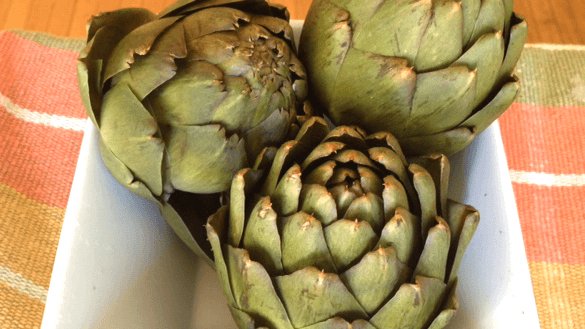 Photo of three artichokes
