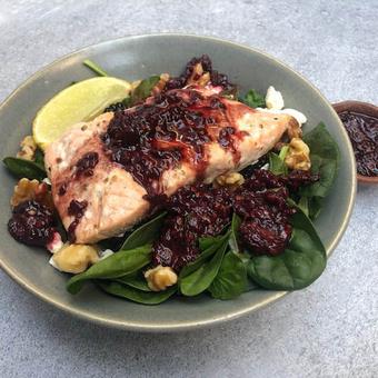 Salmon in bowl with toppings