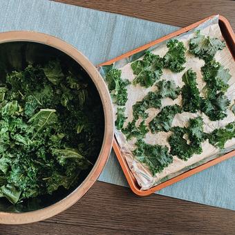 Photo of kale leaves on a baking sheet