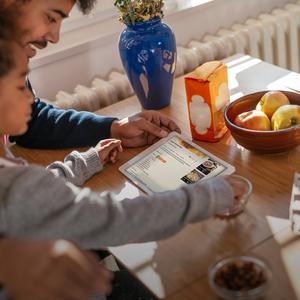 Dad and daughter baking together
