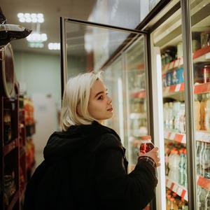 Photo of a girl shopping at convenience store