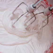 Photo of a bowl of freshly whipped cream