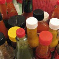 Photo of several types of hot sauces in bottles