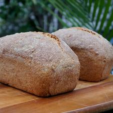 Photo of two loaves of fresh bread
