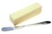 Photo of a stick of butter next to a butter knife