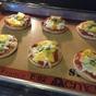 Photo of prepared Mini Pizzas in the oven