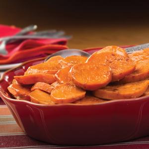 Photo of holiday sweet potatoes in a red baking dish
