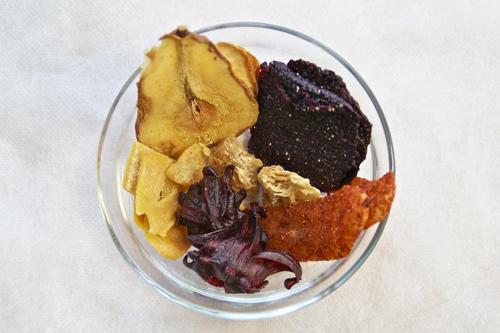Photo of dried fruit in a glass har
