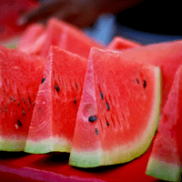 Photo of several pieces of cut watermelon