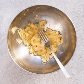 Mashed banana in bowl