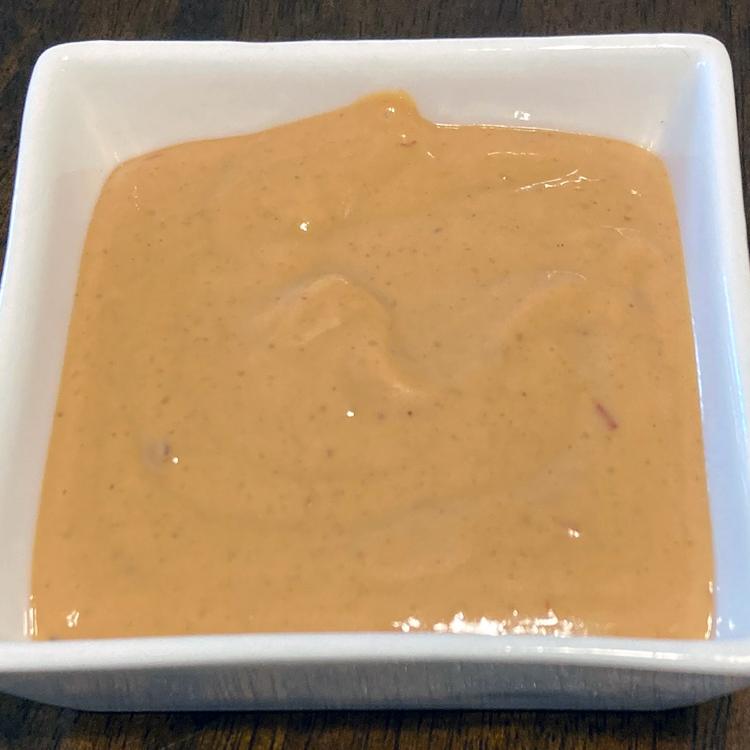 Photo of a small serving dish with peanut butter sauce