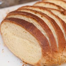 Photo of a loaf of bread, sliced
