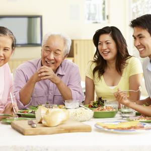 Photo of Family Eating Together
